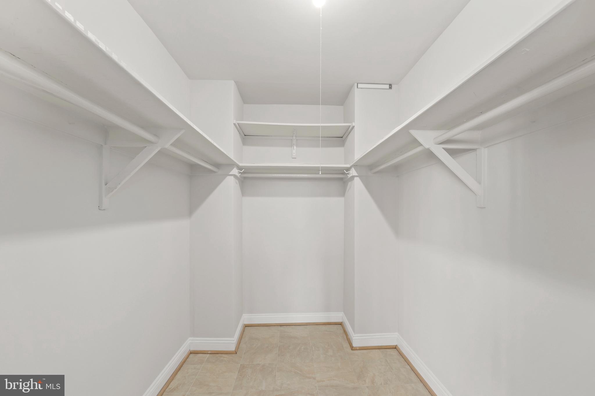 1200 South Arlington Ridge Road, Unit 404 Arlington, VA 22202 - Photo 13 of 32 a view of an empty walk in closet