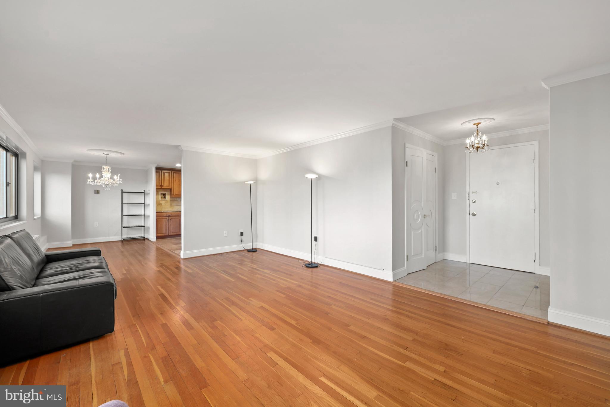 1200 South Arlington Ridge Road, Unit 404 Arlington, VA 22202 - Photo 32 of 32 a view of livingroom with hardwood floor and couch