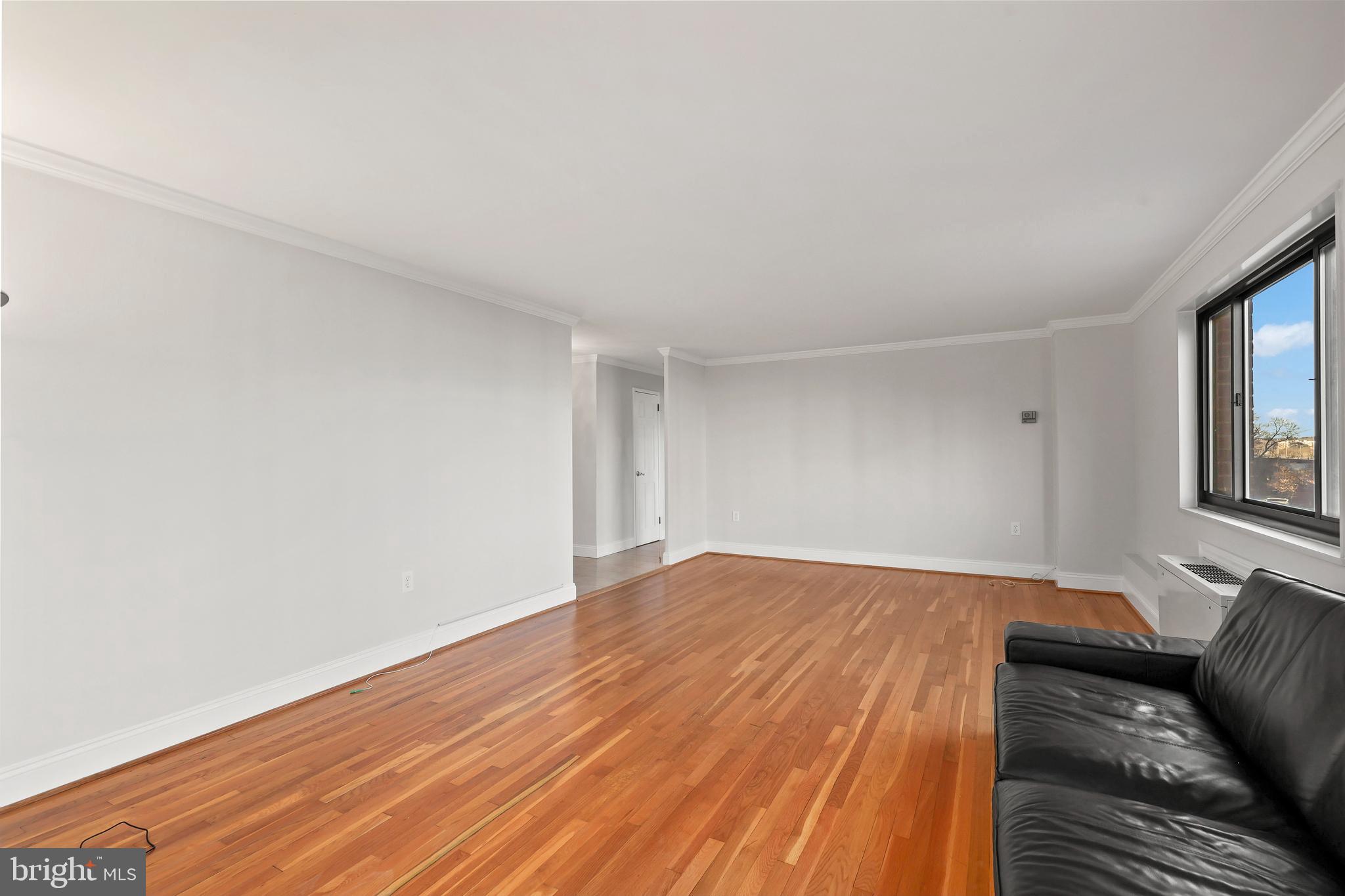 1200 South Arlington Ridge Road, Unit 404 Arlington, VA 22202 - Photo 4 of 32 a view of livingroom with hardwood floor and hallway