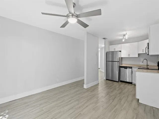 a kitchen with a stove and a microwave