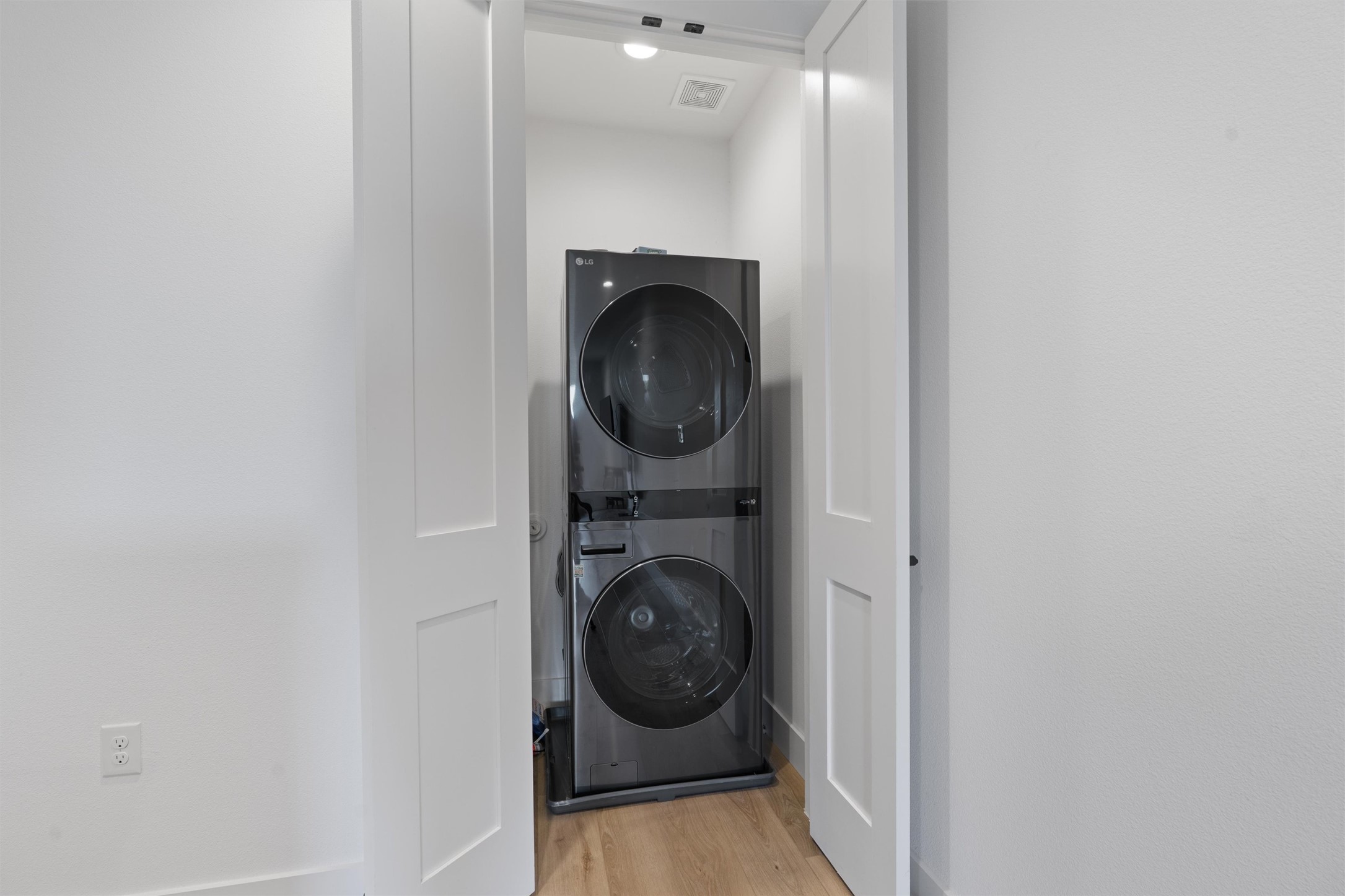 590 Old Mill Road, Unit 153 Cedar Park, TX 78613 - Photo 23 of 40 a close view of utility room with washer and dryer