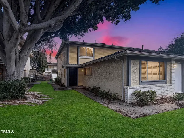 a view of a kitchen from the hallway