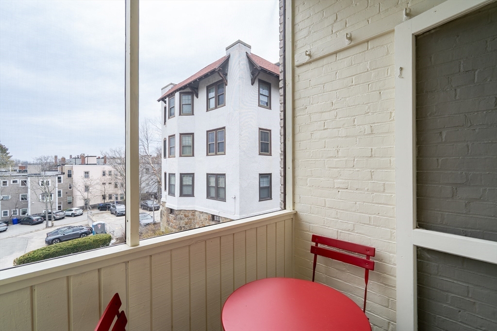 321 Tappan Street, Unit 3 Brookline, MA 02445 - Photo 20 of 39 a view of a balcony with chairs