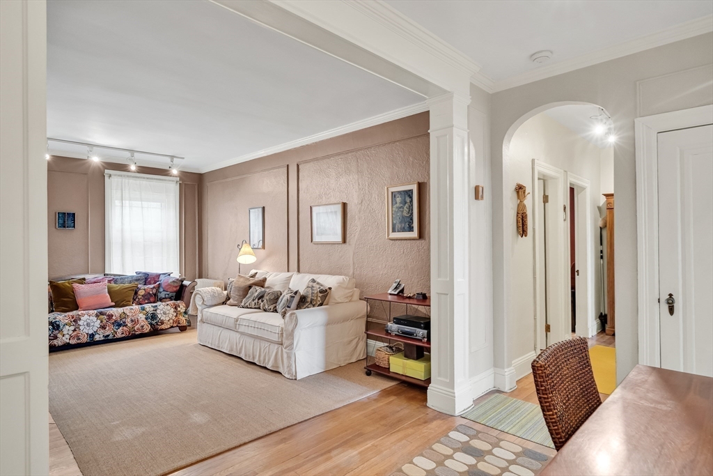 321 Tappan Street, Unit 3 Brookline, MA 02445 - Photo 2 of 39 a living room with furniture and a couch