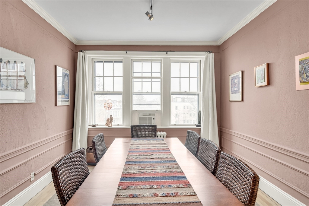 321 Tappan Street, Unit 3 Brookline, MA 02445 - Photo 10 of 39 a spacious bedroom with a large bed and a couch