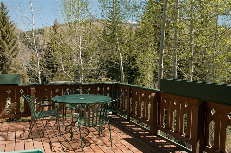 355 West Forest Road, Unit A Vail, CO 81657 - Photo 4 of 7 a view of a chairs and table on the wooden floor