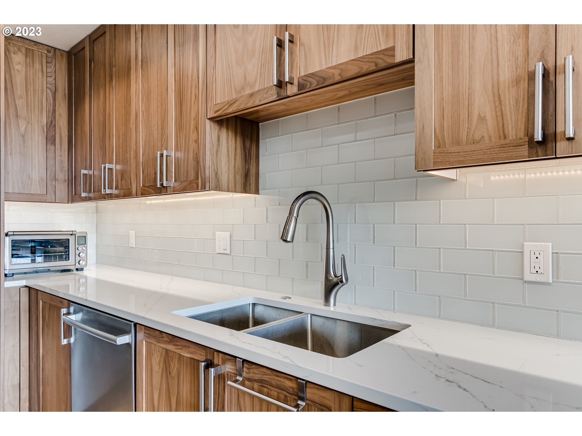 1600 Pearl Street Eugene, OR 97401 - Photo 4 of 21 a kitchen with a sink and cabinets