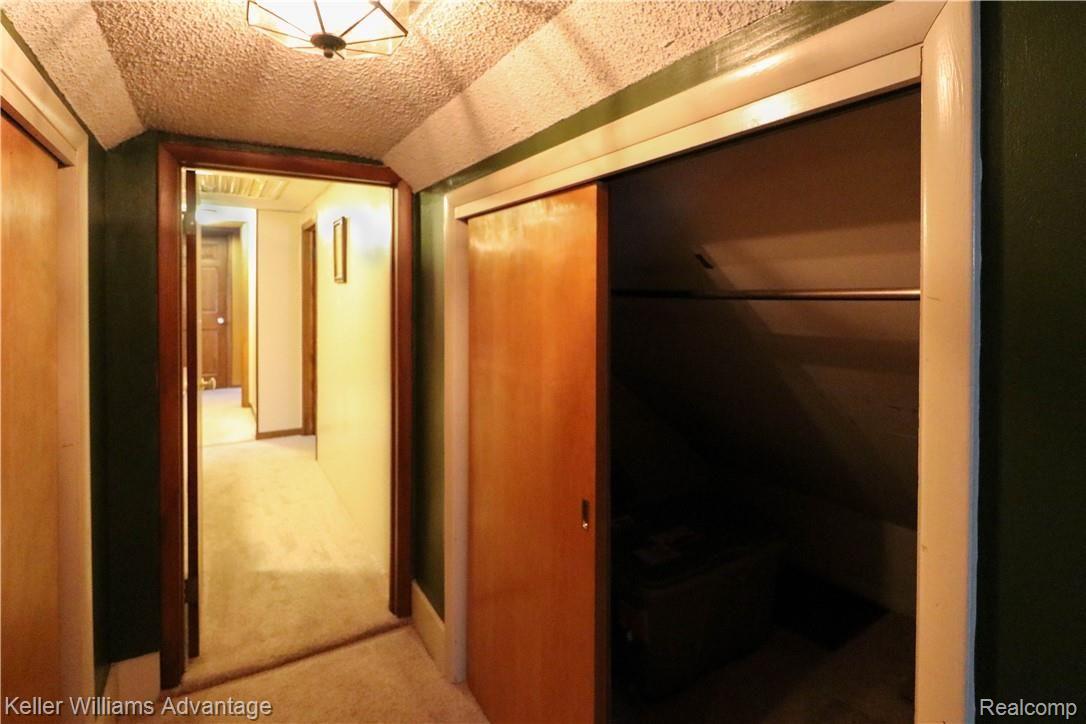 4679 Hegel Road Goodrich, MI 48438 - Photo 27 of 41 Third Bedroom down the hall on the second floor features a unique layout with lots of closet space!