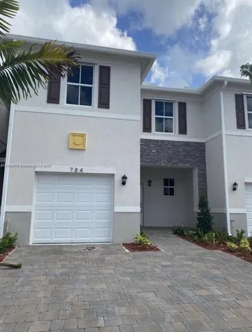 a front view of house with yard