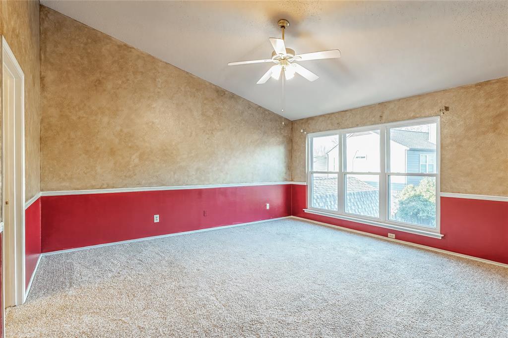 716 Bridget Way Hurst, TX 76054 - Photo 17 of 33 Carpeted spare room featuring a ceiling fan and baseboards