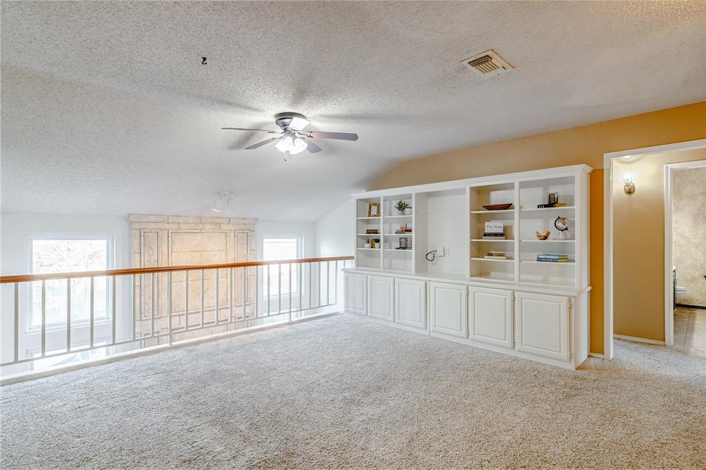 716 Bridget Way Hurst, TX 76054 - Photo 22 of 33 Empty room featuring ceiling fan and carpet