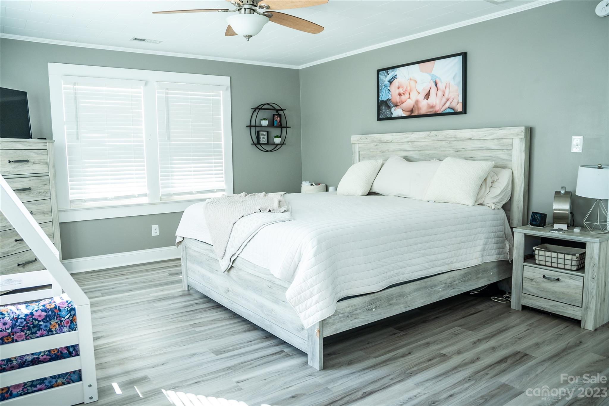 106 Cascade Street Morganton, NC 28655 - Photo 16 of 36 a large white bed in a bedroom next to a window