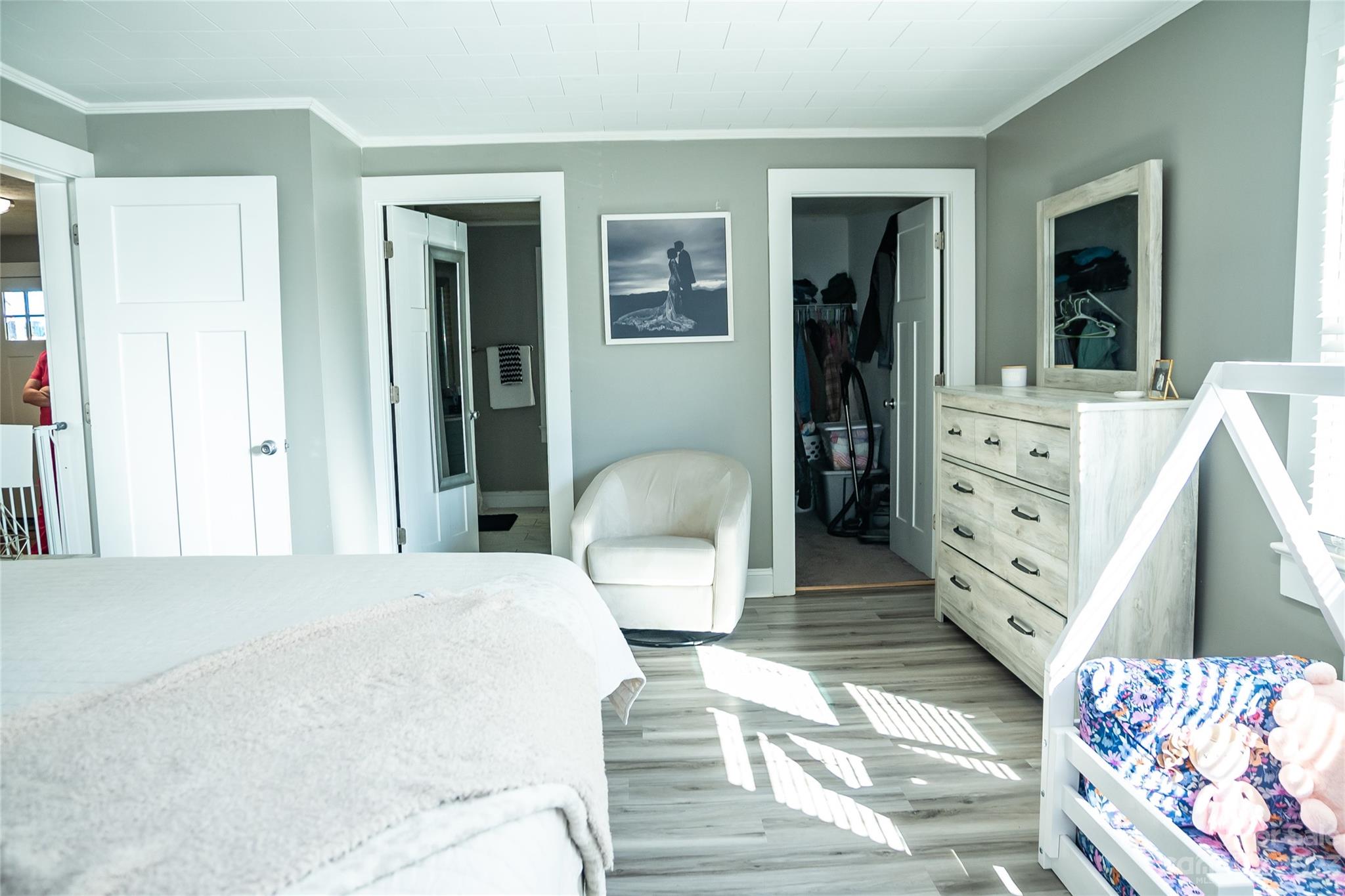 106 Cascade Street Morganton, NC 28655 - Photo 17 of 36 a bedroom with a bed and a dresser