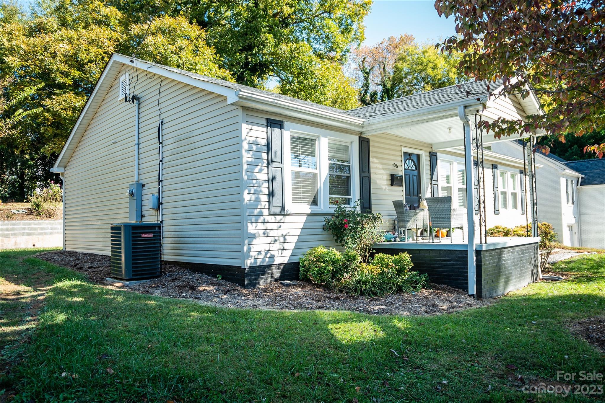 106 Cascade Street Morganton, NC 28655 - Photo 2 of 36 a view of a house with backyard and garden