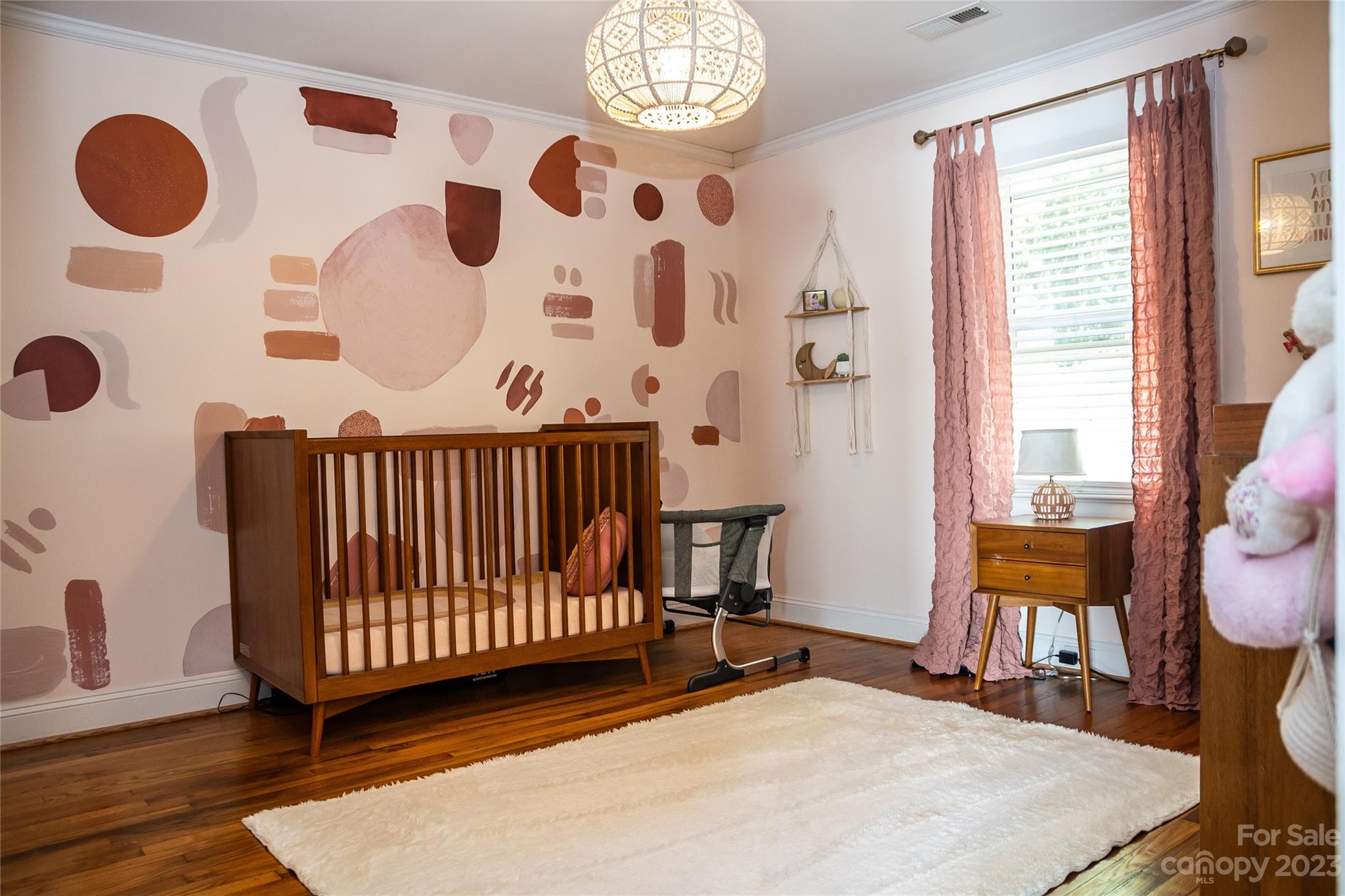 106 Cascade Street Morganton, NC 28655 - Photo 21 of 36 a bedroom with furniture and a window