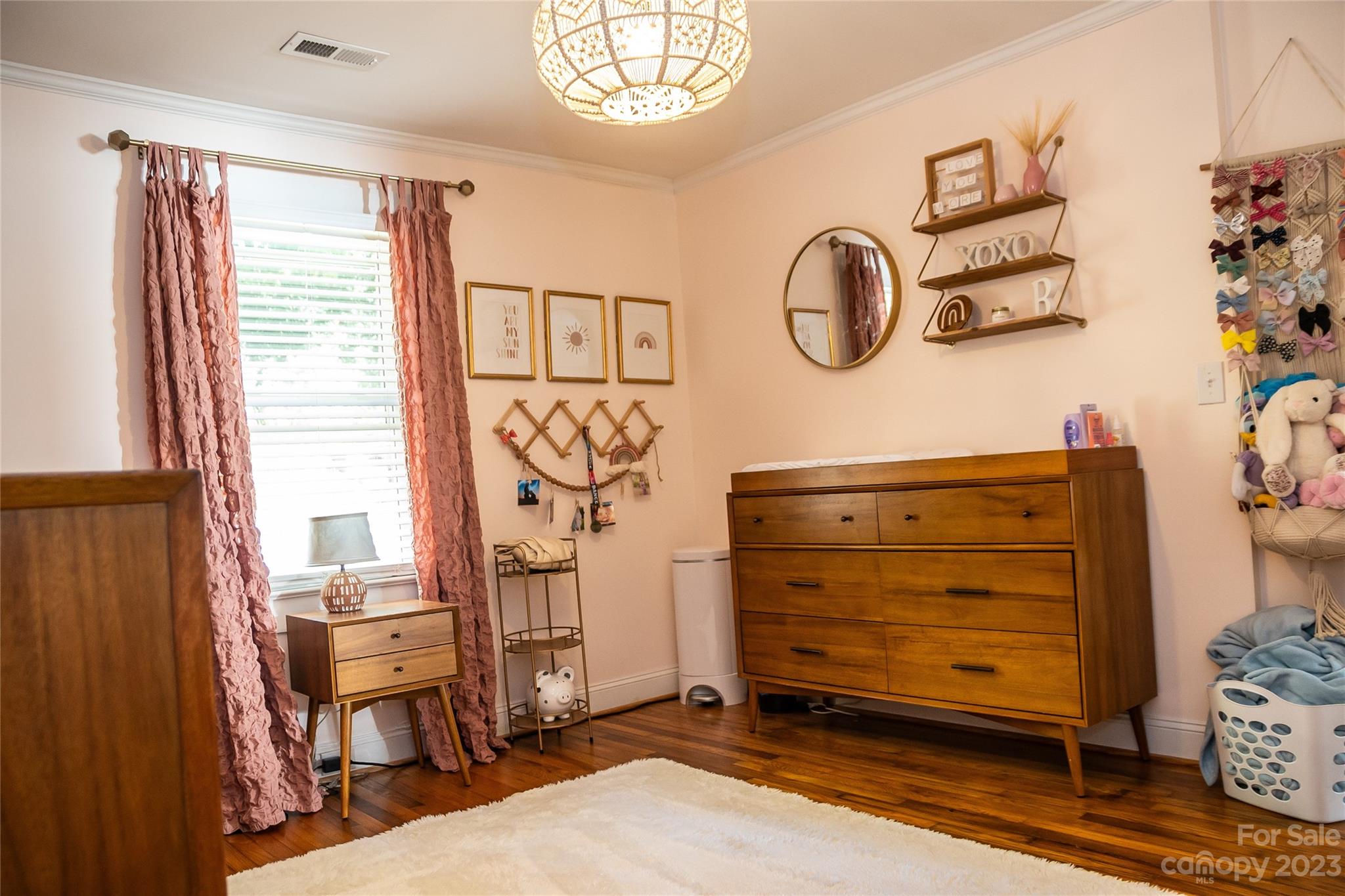 106 Cascade Street Morganton, NC 28655 - Photo 22 of 36 a view of walk in closet with clothes and shoes
