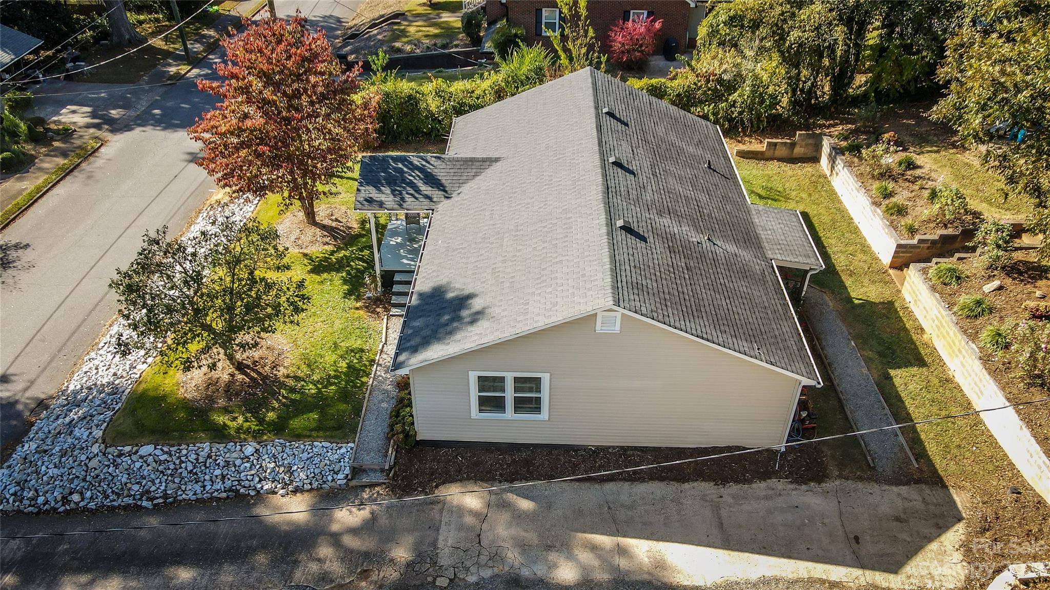106 Cascade Street Morganton, NC 28655 - Photo 29 of 36 a view of a house with a yard