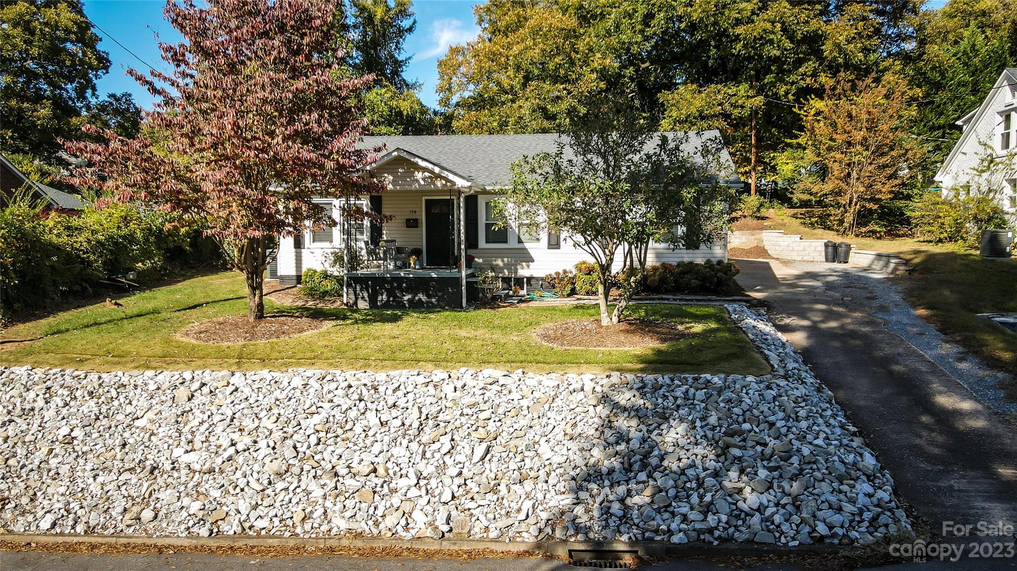106 Cascade Street Morganton, NC 28655 - Photo 3 of 36 a view of a house with a yard