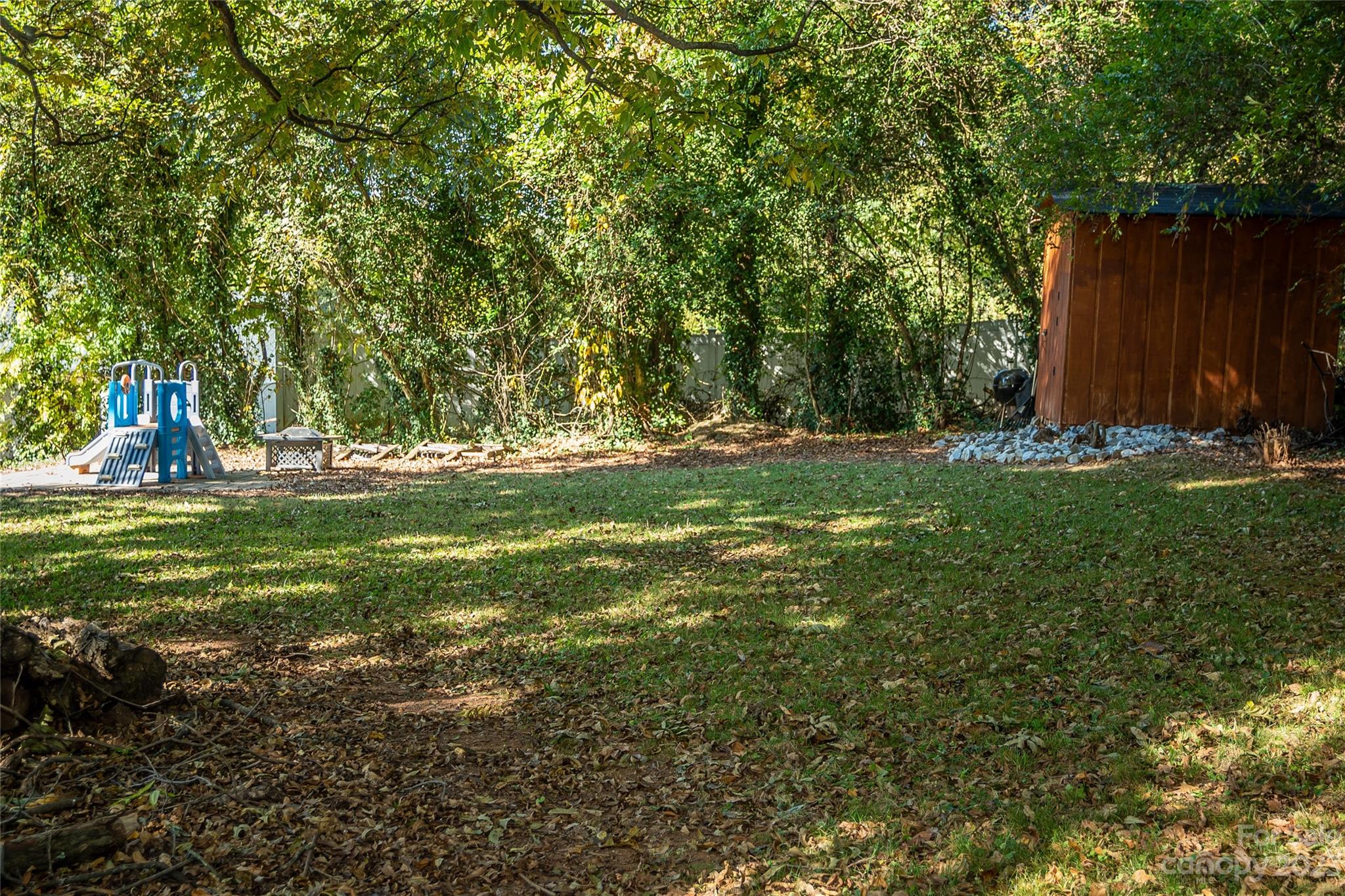 106 Cascade Street Morganton, NC 28655 - Photo 33 of 36 a view of a park with large trees