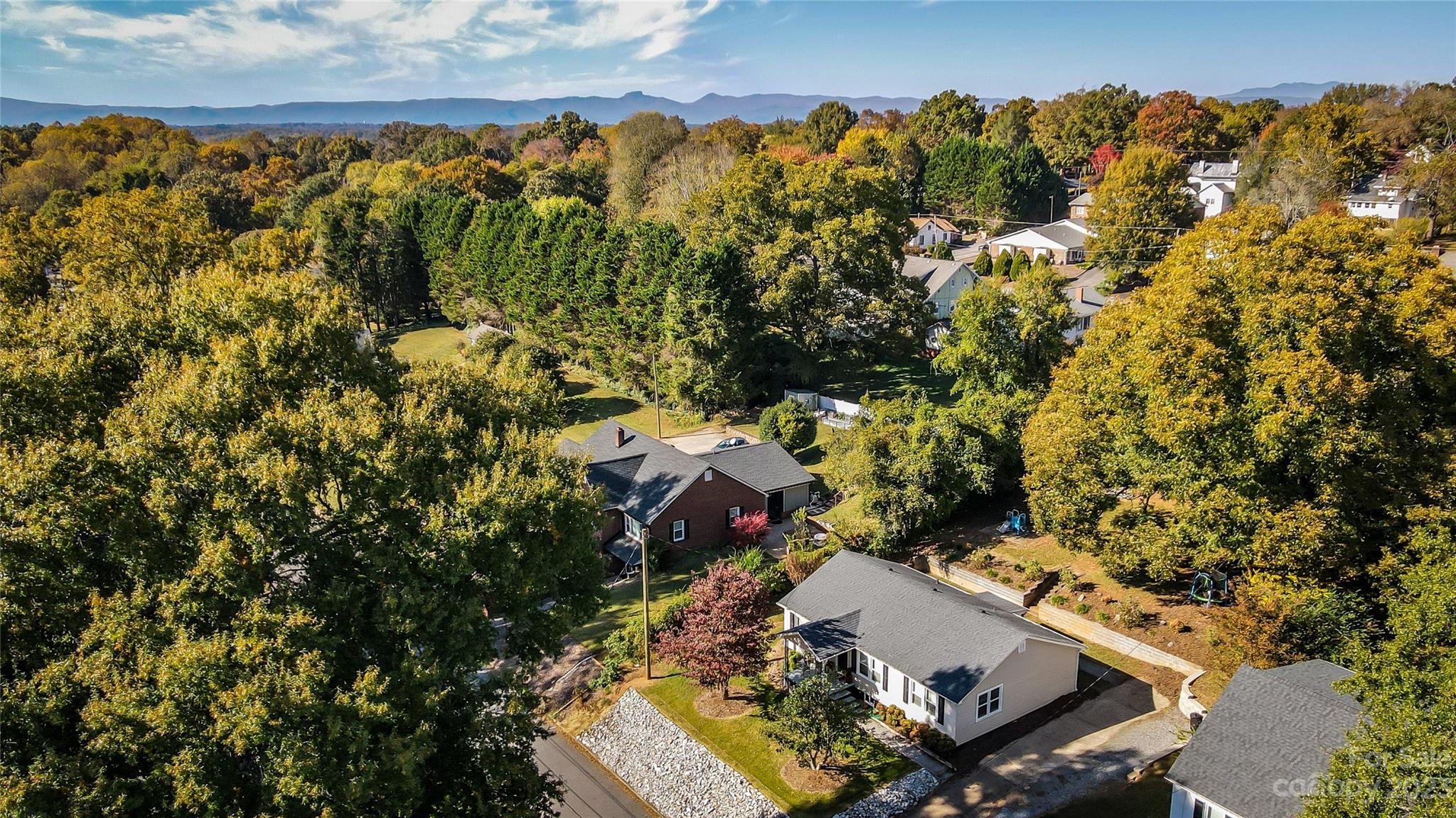106 Cascade Street Morganton, NC 28655 - Photo 35 of 36 an aerial view of a house with a yard
