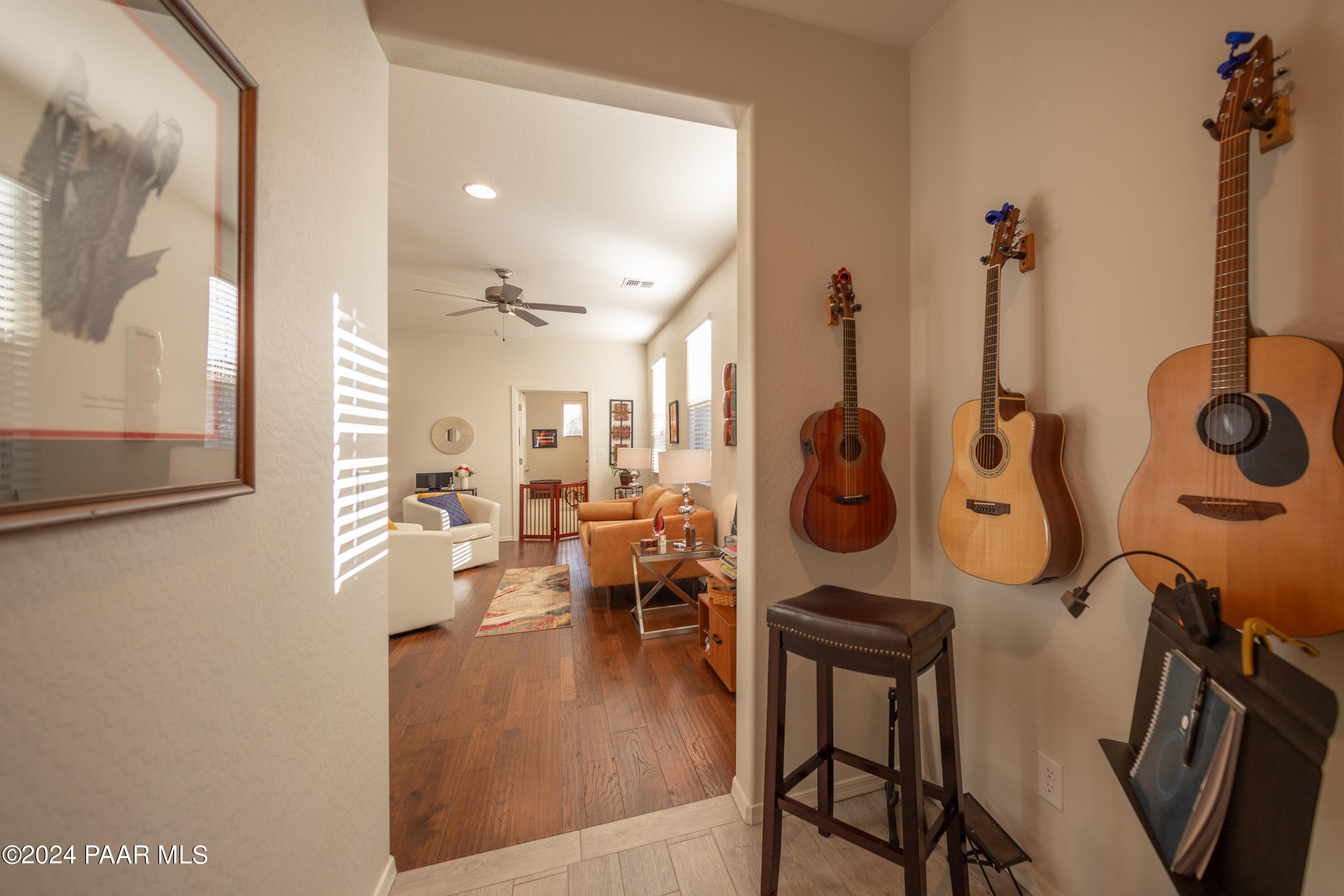 1109 Stack Rock Road Prescott Valley, AZ 86314 - Photo 27 of 91 a view of living room with furniture and floor to ceiling window