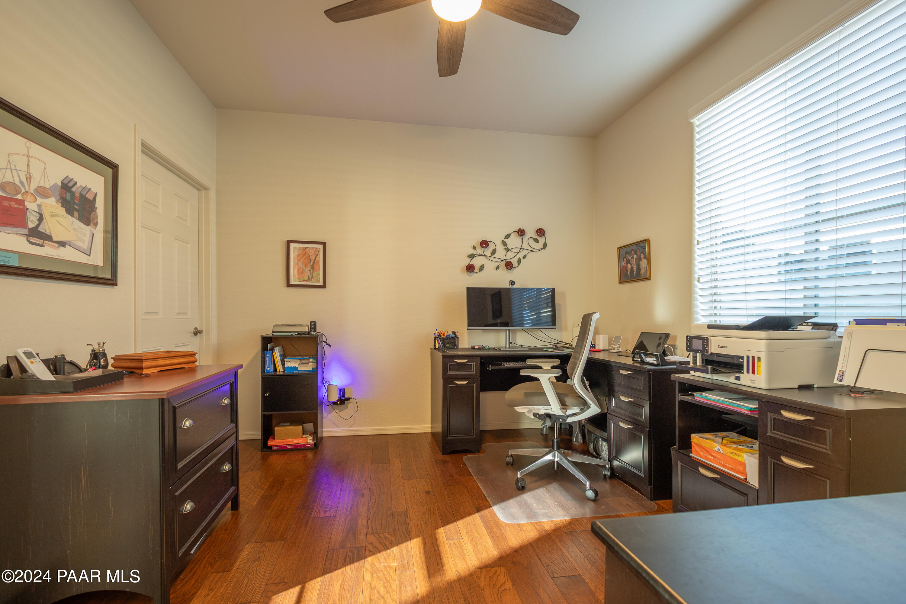 1109 Stack Rock Road Prescott Valley, AZ 86314 - Photo 30 of 91 a view of a workspace with furniture and a window