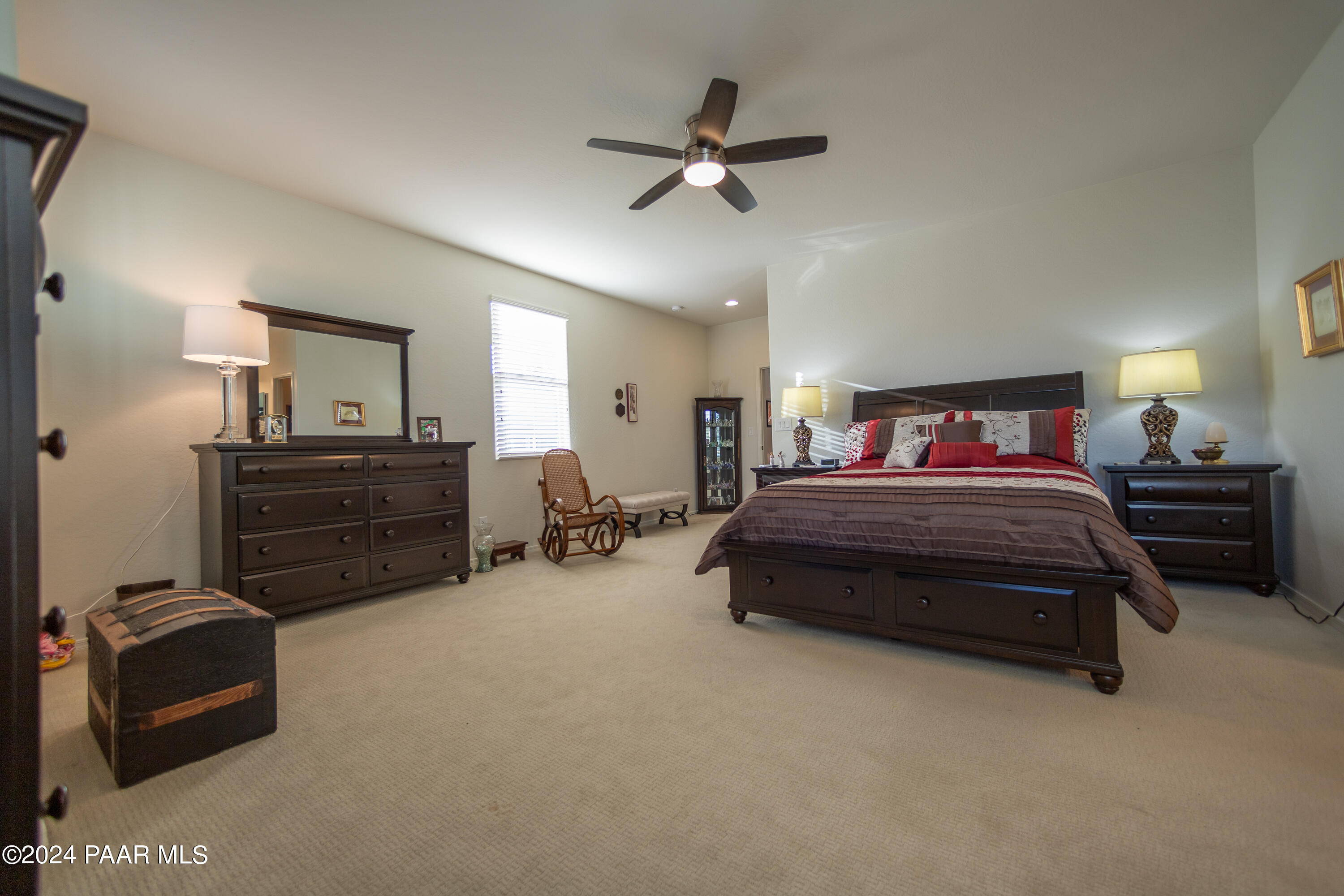 1109 Stack Rock Road Prescott Valley, AZ 86314 - Photo 39 of 91 a bedroom with a bed and a couch