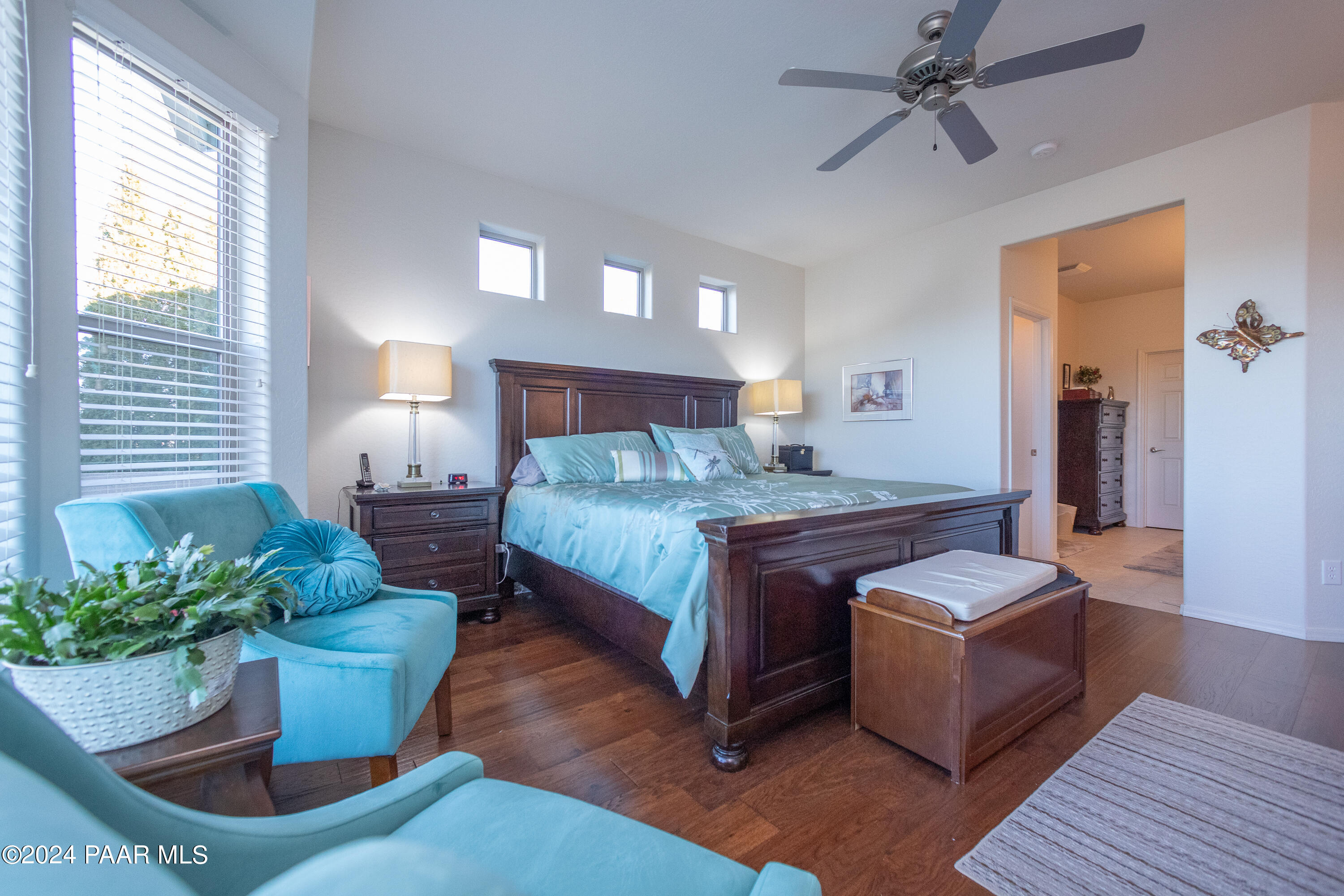 1109 Stack Rock Road Prescott Valley, AZ 86314 - Photo 48 of 91 a bedroom with furniture and a potted plant