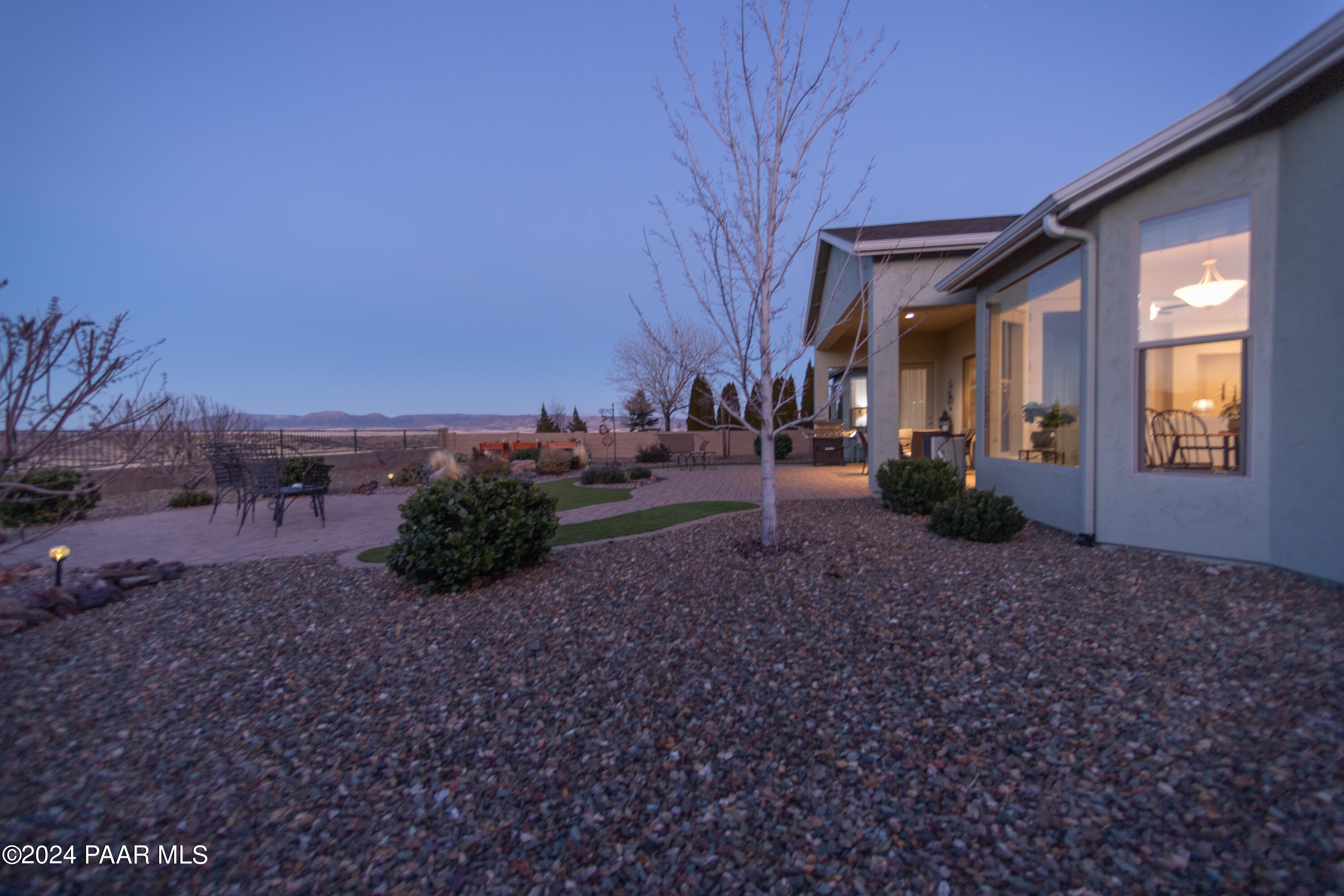 1109 Stack Rock Road Prescott Valley, AZ 86314 - Photo 60 of 91 a view of a house with a backyard