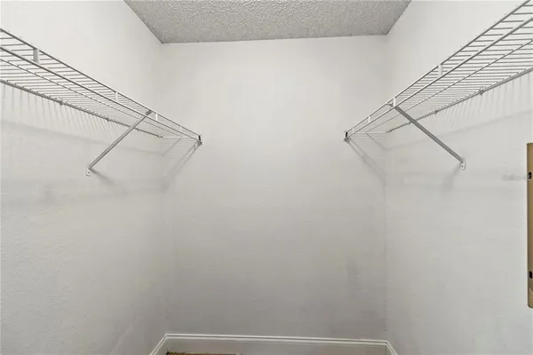 a view of small space with racks on the wall