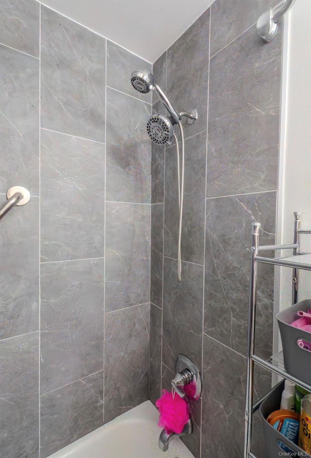 276 Temple Hill Road, Unit 704 New Windsor, NY 12553 - Photo 13 of 18 a bathroom with a shower