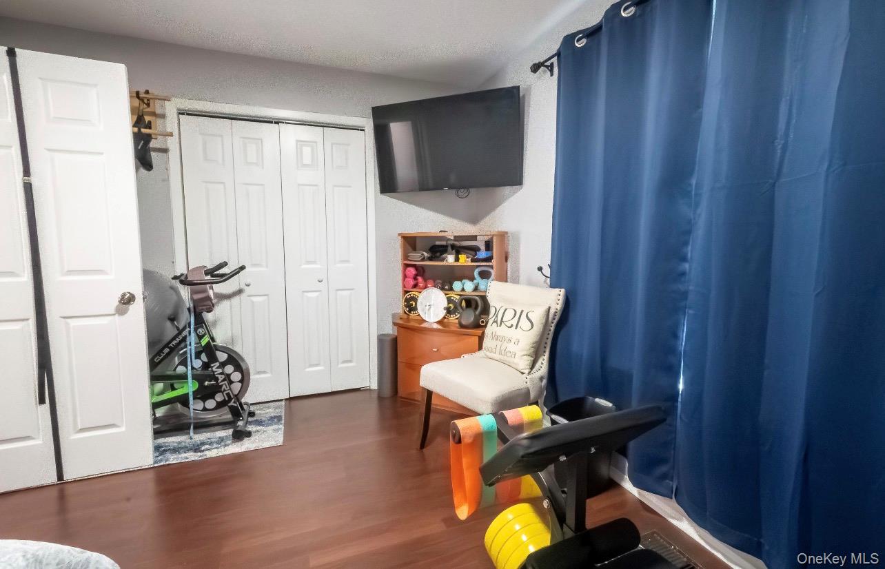276 Temple Hill Road, Unit 704 New Windsor, NY 12553 - Photo 15 of 18 a workspace room with furniture and wooden floor