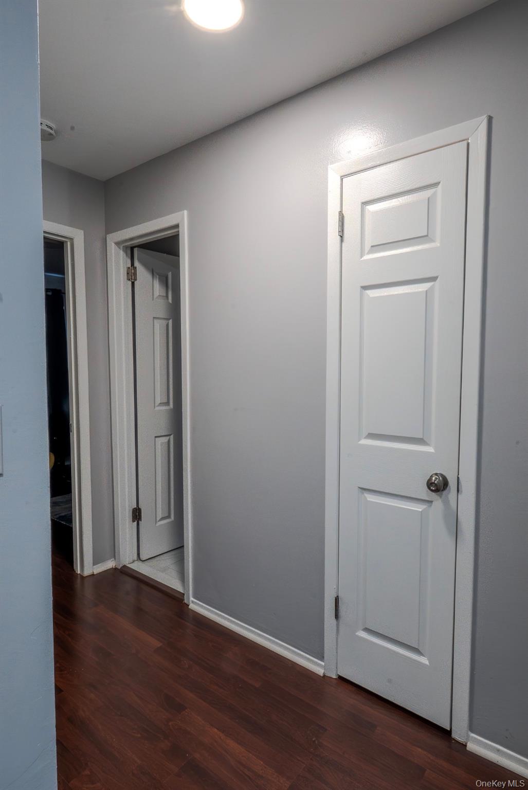 276 Temple Hill Road, Unit 704 New Windsor, NY 12553 - Photo 7 of 18 an empty room with wooden floor & closet area