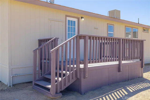 a view of a balcony with an ocean view