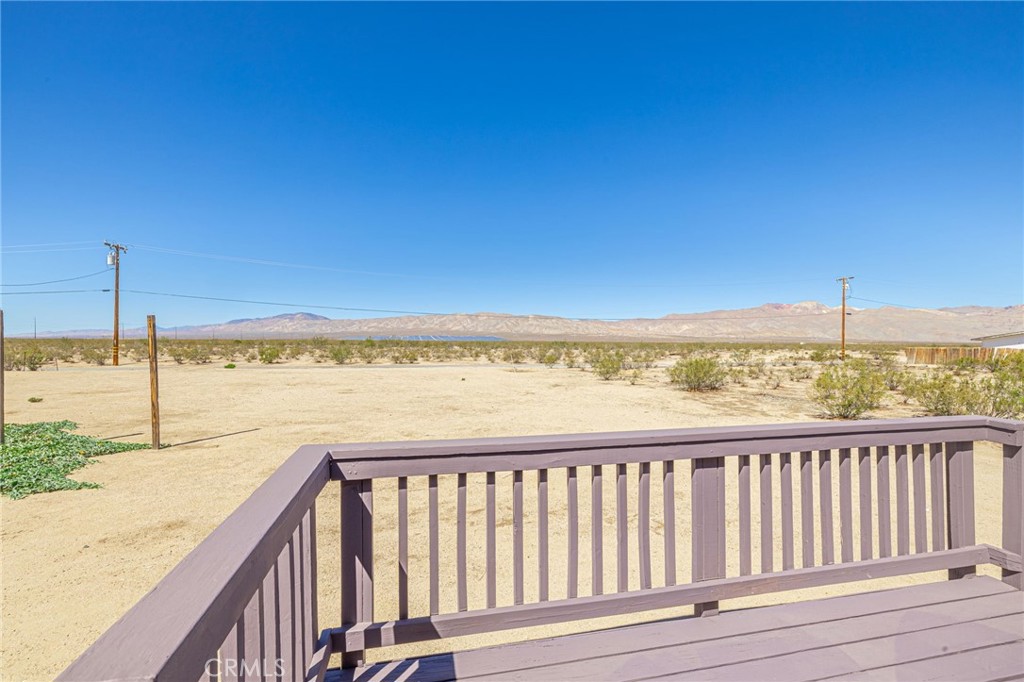 26321 Olanche Street Mojave, CA 93501 - Photo 32 of 39 a view of a balcony with an ocean view