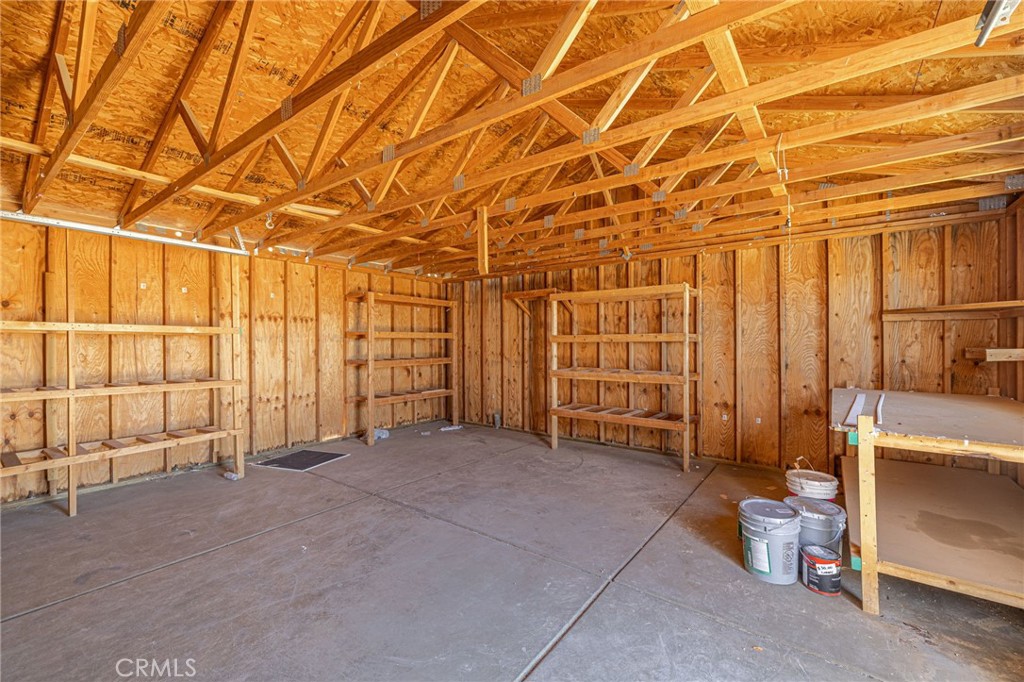 26321 Olanche Street Mojave, CA 93501 - Photo 35 of 39 a view of a room with lots of wooden cabinets