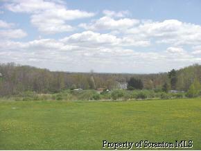 654 Rd Tunkhannock, PA 18657 - Photo 2 of 2 a view of an ocean and beach