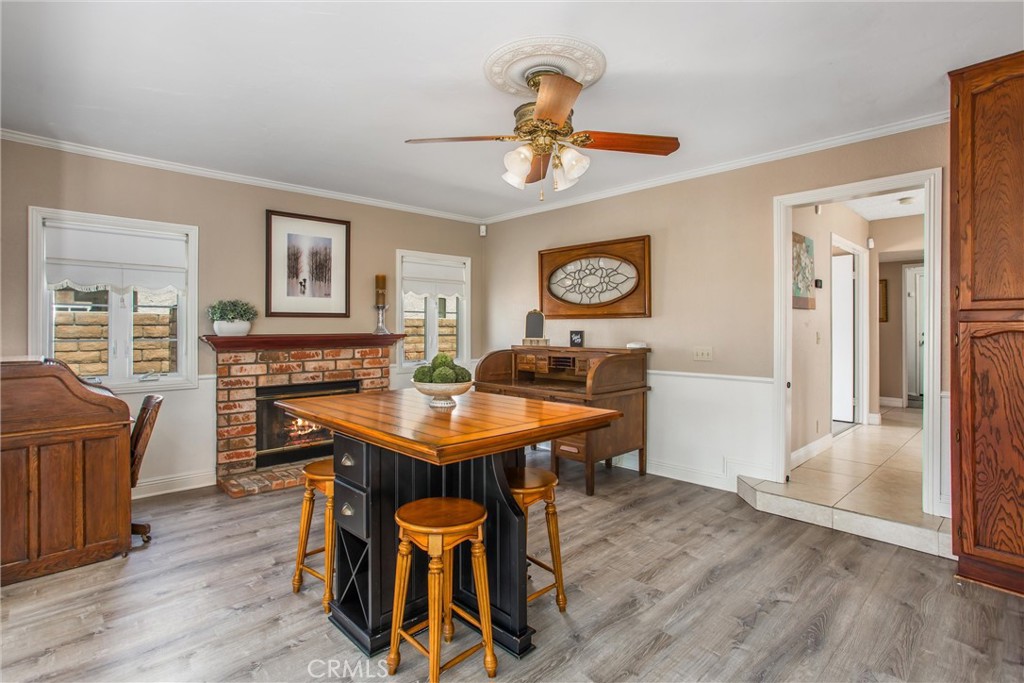 1125 Vía Nice Redlands, CA 92374 - Photo 16 of 50 a view of a dining room with furniture and a chandelier