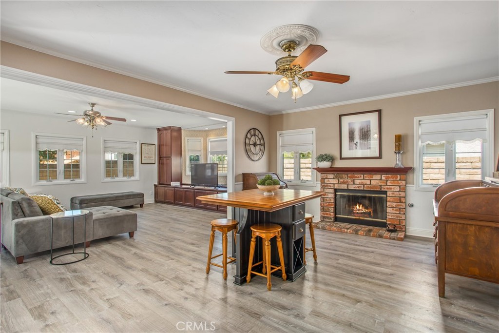 1125 Vía Nice Redlands, CA 92374 - Photo 17 of 50 a living room with furniture and a fireplace