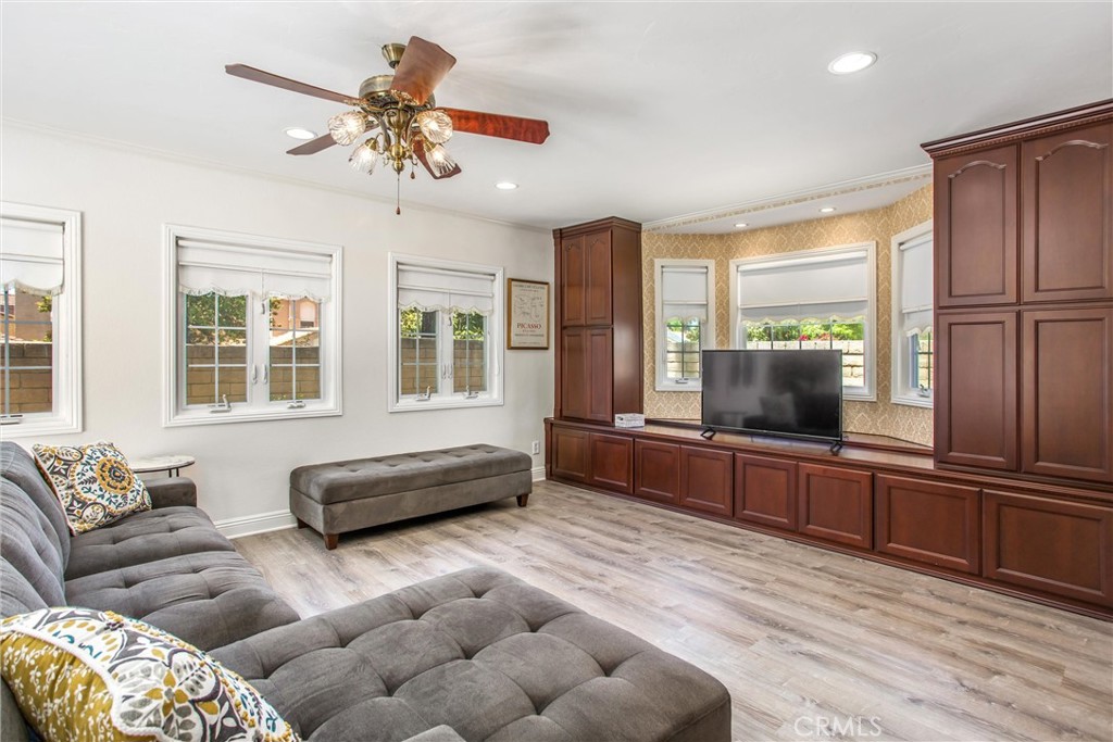 1125 Vía Nice Redlands, CA 92374 - Photo 19 of 50 a living room with furniture and a flat screen tv