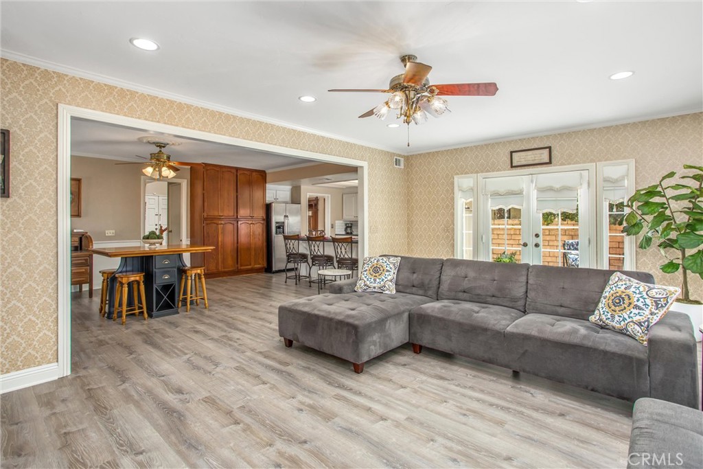 1125 Vía Nice Redlands, CA 92374 - Photo 21 of 50 a living room with furniture and wooden floor