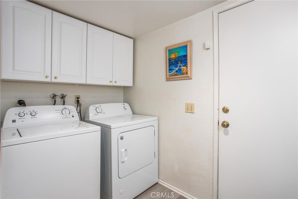 1125 Vía Nice Redlands, CA 92374 - Photo 26 of 50 a utility room with dryer and washer