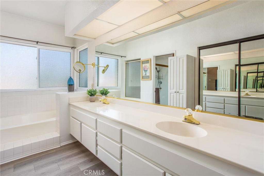 1125 Vía Nice Redlands, CA 92374 - Photo 37 of 50 a bathroom with a sink and a mirror