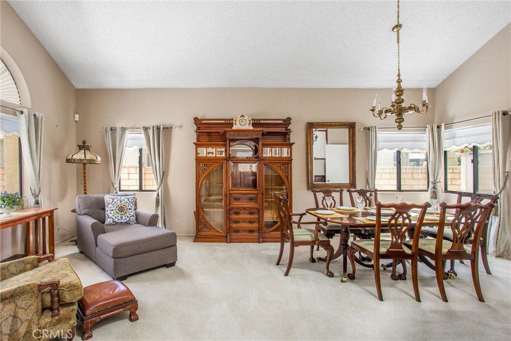 1125 Vía Nice Redlands, CA 92374 - Photo 4 of 50 a view of a livingroom with furniture and window