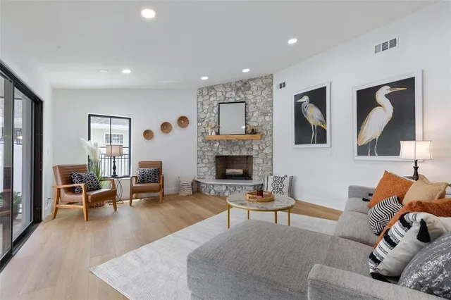a view of a livingroom with furniture and a table