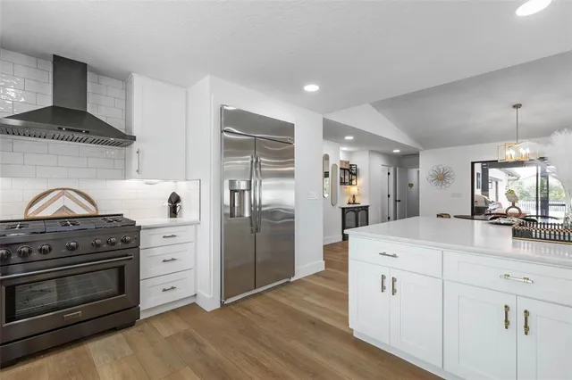 a bathroom with a sink vanity and a mirror