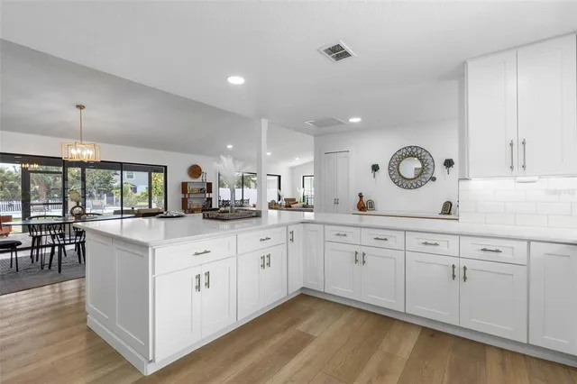 a bathroom with a shower and a sink