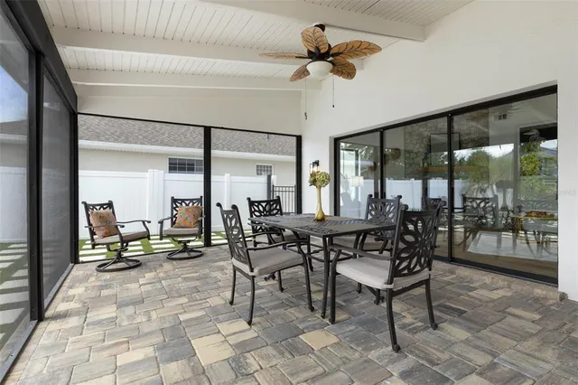 a bedroom with bed and a table