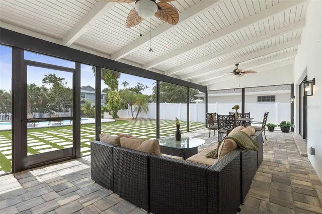 a bathroom with a sink mirror and toilet