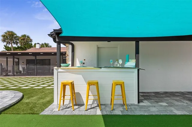 a bedroom with a bed and a mirror